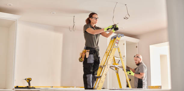 Best Affordable Electrician  in Postville, IA